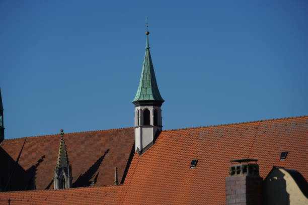 Beaver tails as roofing are very popular in bavaria especially on steep roofs, photographed on a spring afternoon