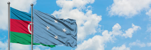 istock Azerbaijan and Micronesia flag waving in the wind against white cloudy blue sky together. Diplomacy concept, international relations. 1146705000
