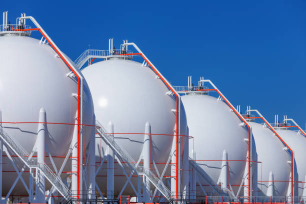 Pressurized Gas Tanks A gas cylinder or tank is a pressure vessel for storage and containment of gases at above atmospheric pressure. liquefied natural gas stock pictures, royalty-free photos & images