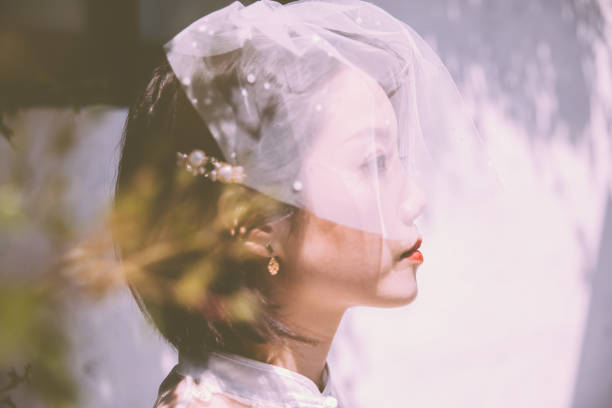 Bride and Groom Bride and Groom in Beijing,China. chinese wedding dress stock pictures, royalty-free photos & images