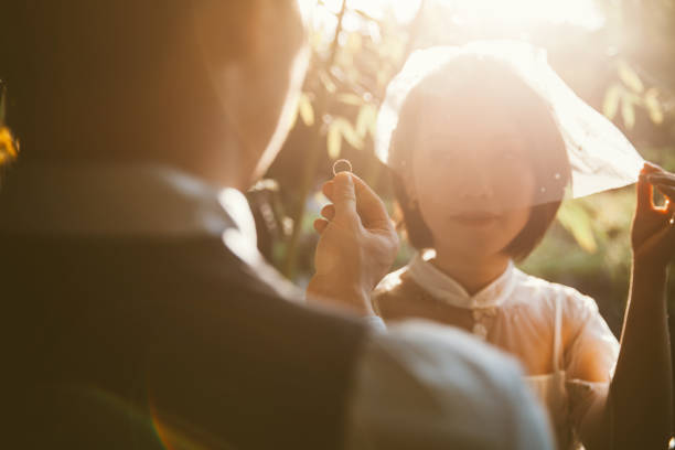 Bride and Groom Bride and Groom in Beijing,China. chinese wedding dress stock pictures, royalty-free photos & images