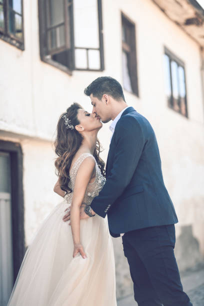 istock Bride And Groom Kissing Passionately While Expressing Their Love 1146711350