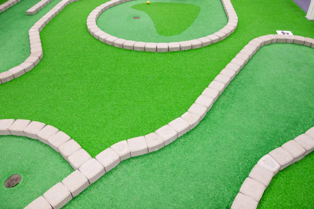 istock Mini golf court in children activity park. 1146712380