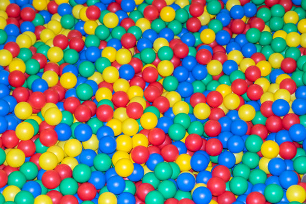 istock Pool with many colored balls in the kids playing room. 1146714905