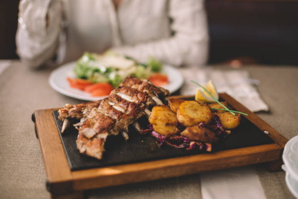 Close-up of delicious ribs with potatoes