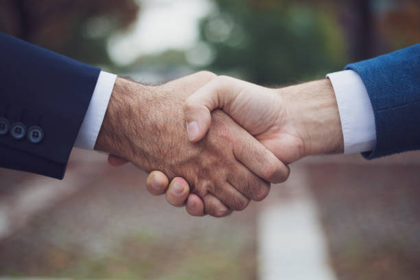 istock Businessman handshake - partnership 1146718254