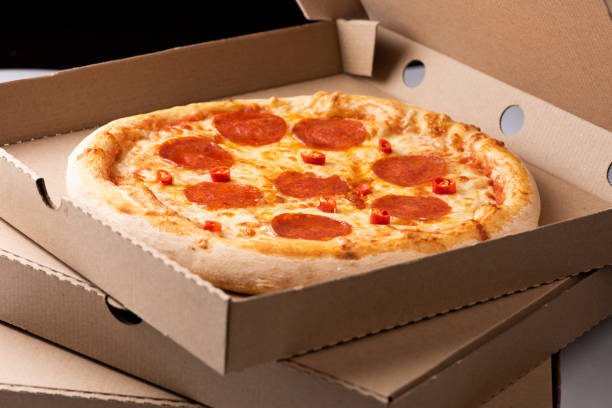 istock Pepperoni Pizza in box close up 1146721925