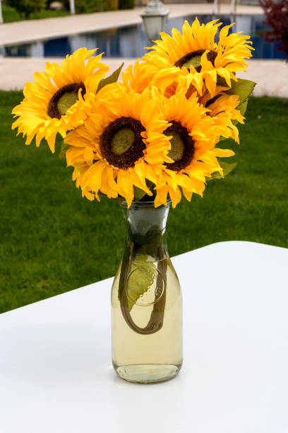 istock Sunflowers bouquet on table in the garden 1146723728