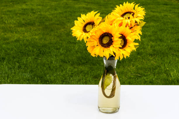 istock Sunflowers bouquet on table in the garden 1146723731