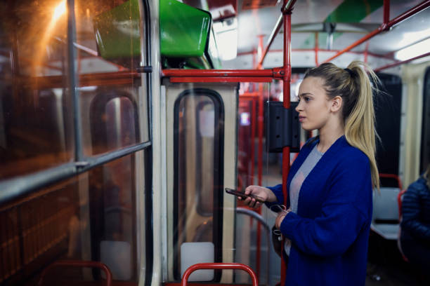 istock Young woman in public transportation 1146724329