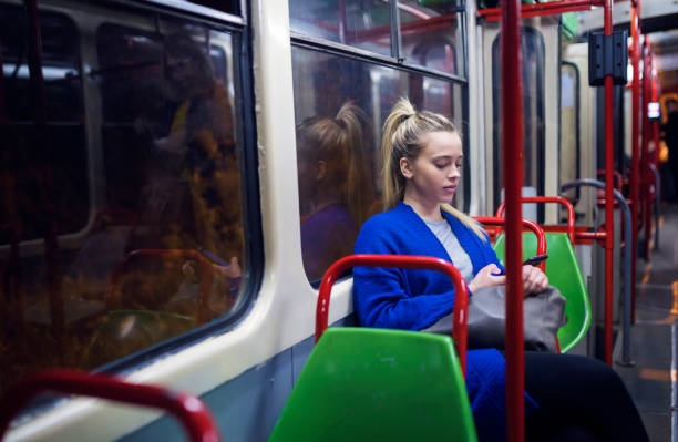 istock Young woman in public transportation 1146724454