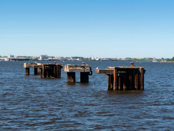 istock Mooring platforms in the River Warnow, Germany 1146728825