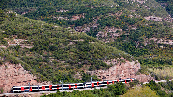 The train in mountain near Santa Maria de Montserrat Abbey
