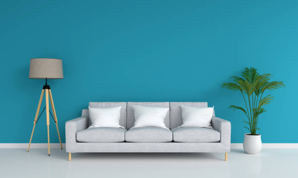istock Gray sofa and lamp in blue living room, 3D rendering 1146730006