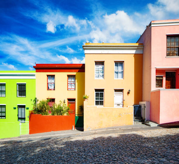 Row of colorful houses in Cape Town Row of colorful houses in Cape Town built on a hillside malay quarter photos stock pictures, royalty-free photos & images