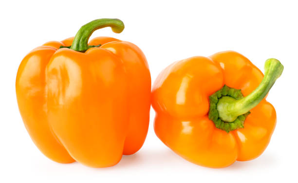 istock Two ripe bell peppers on a white, isolated. 1146730897