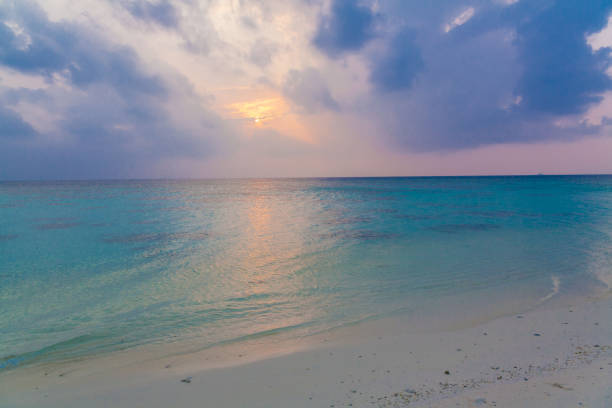 Beautiful nature landscape. Tropical sunset sea beach. Island atoll in Maldives. Great travel view. Luxury holiday resort. Amazing nature paradise. Impressive summer panorama.