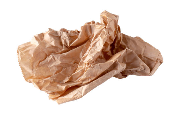 istock Used brown paper bag isolated over white background 1146732068