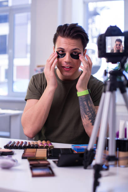 istock Positive good-looking beauty blogger using new patches for eyes 1146734043