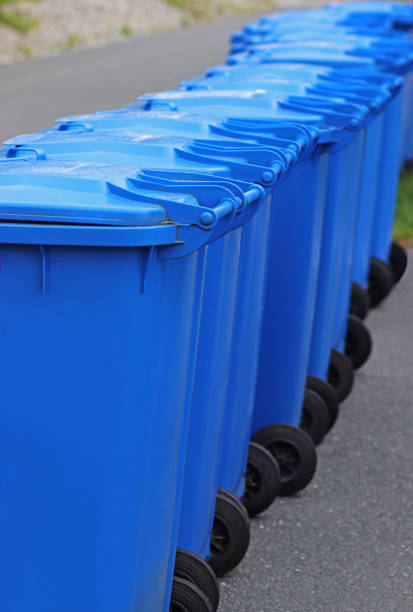 istock row of garbage cans, close-up 1146740714