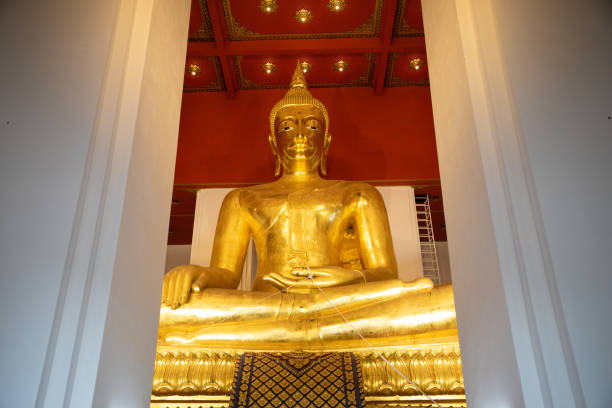 istock bottom view from a Giant gold Buddha inside a temple in Thailand 1146741076