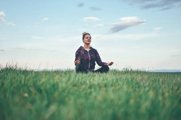 istock Young woman practicing yoga 1146741277
