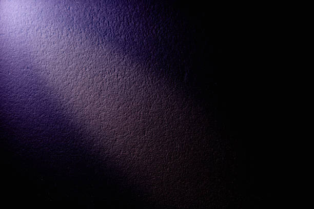 istock Dark purple background with white glow in the middle 1146744477