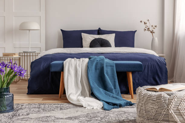 istock Open book on pouf in contemporary bedroom interior 1146746206