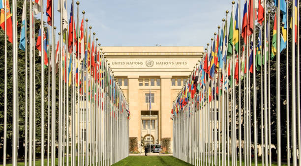 Switzerland; Geneva; March 12, 2019; The rows of the United Nations member states flags in front of the United Nations Office in Geneva; stock photo