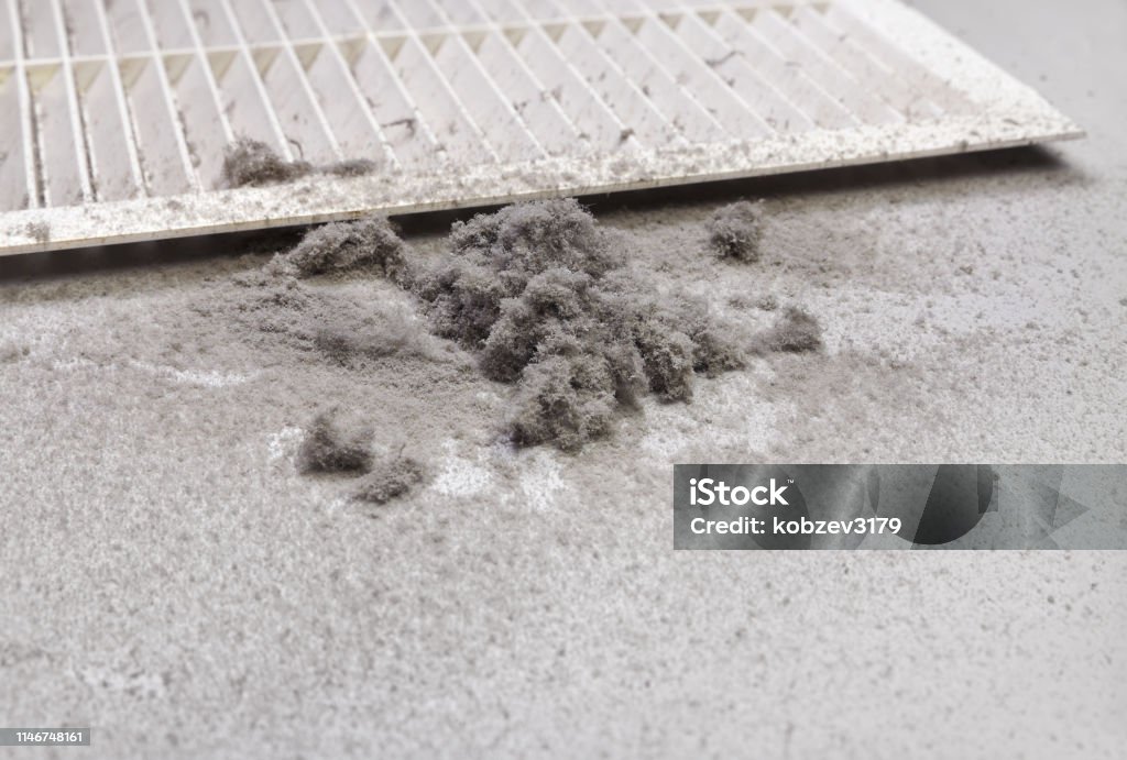 Dust collected from the air duct filter. Dust is collected from the duct filter. Harmful dust in the room Air Duct Stock Photo