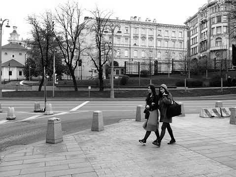 Moscow, Russia - May 03, 2019: two young women are walking on the street