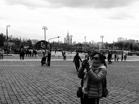 Moscow, Russia - May 03, 2019: tourists while visiting Red Square and the Kremlin