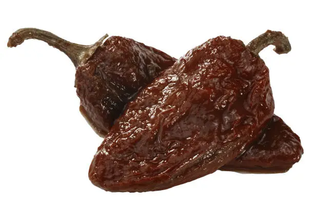 Chipotle en Adobo, a smoke-dried Jalapeno peppers in seasoning, top view