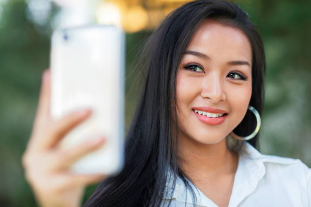 istock Young woman takes a selfie 1146755114