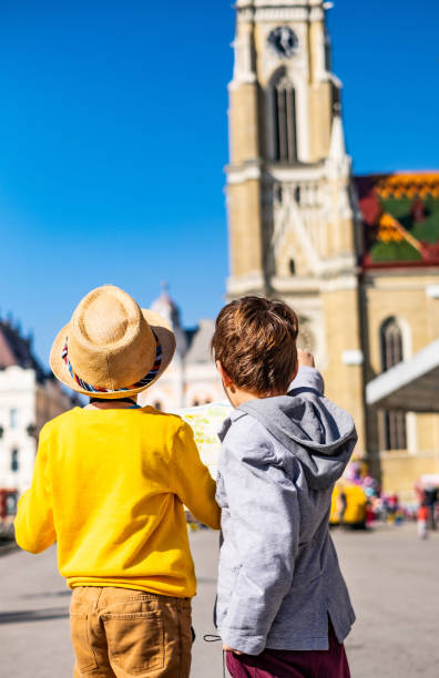 istock Rear view two small boys tourist 1146758463