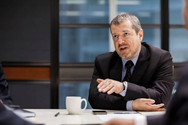 istock Businessman explaining positioning in meeting 1146767341