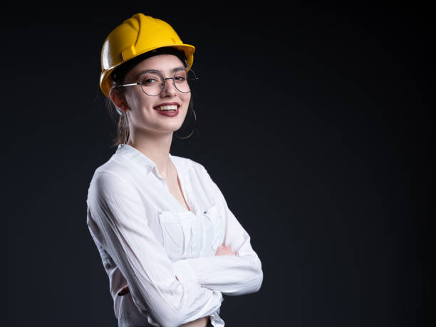 istock Worker woman with yellow helmet 1146767524