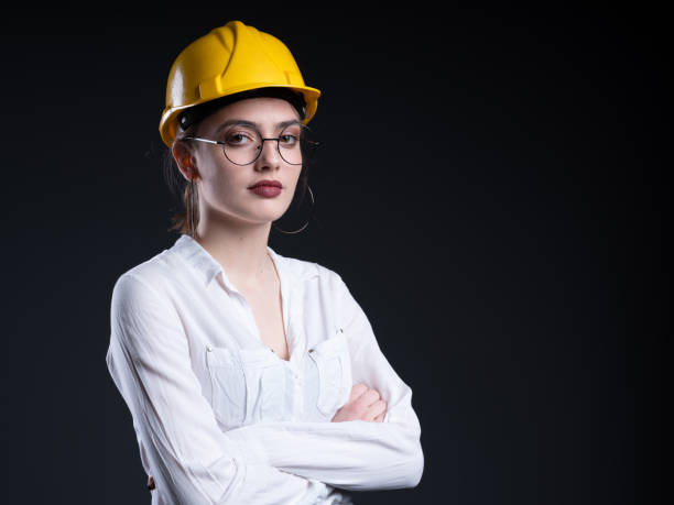 istock Worker woman with yellow helmet 1146767530