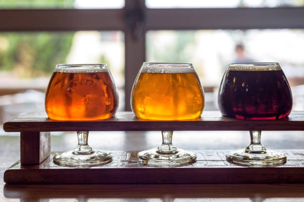 istock Closeup of beer glasses in sunlight 1146769064