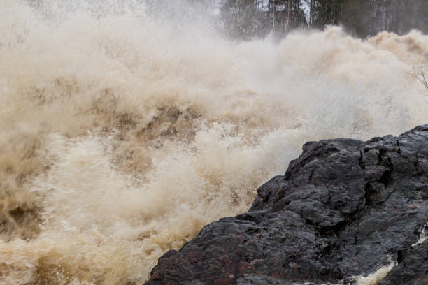 istock Stormy mountain river with large waves 1146770297