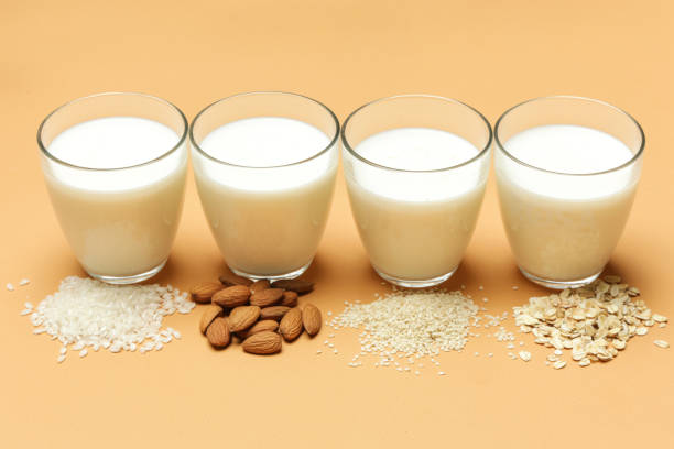 istock Organic vegan non-dairy plant-based milk, studio shot on bright orange background 1146771630