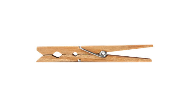 istock Old Wooden clothes pin isolated on white background 1146776597