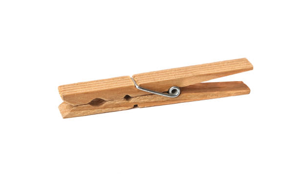 istock Old Wooden clothes pin isolated on white background 1146776637