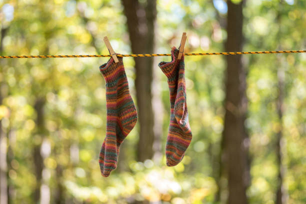 Clothes washing laundry hanging to dry outdoors. Camping on holidays trip