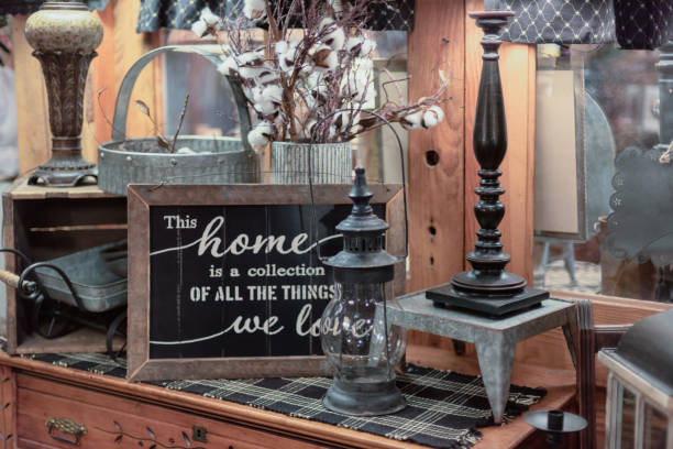 Rustic farmhouse home decor items arranged on wooden chest