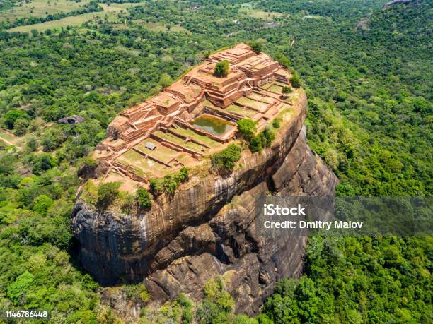 Aerial View From Above Of Sigiriya Or The Lion Rock An Ancient Fortress And A Palace With Gardens Pools And Terraces Atop Of Granite Rock In Dambulla Sri Lanka Surrounding Jungles And Landscape Stock Photo - Download Image Now
