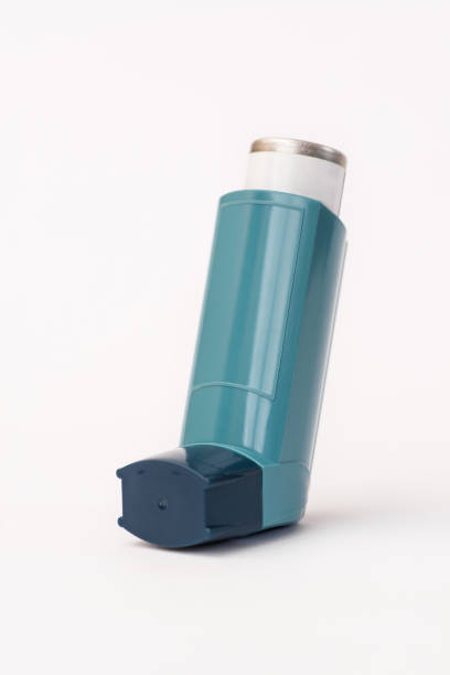 Asthma inhaler on white background stock photo