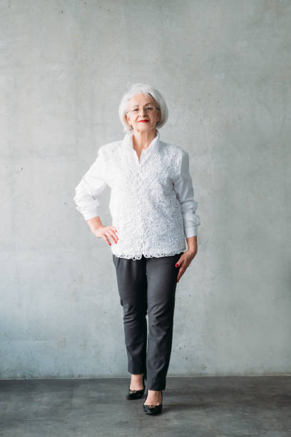 istock senior lady hand hip confident business ceo 1146790863