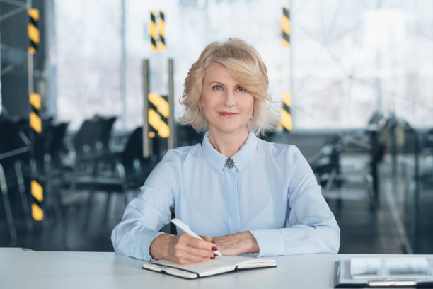 istock confident business woman work writing top coach 1146790873