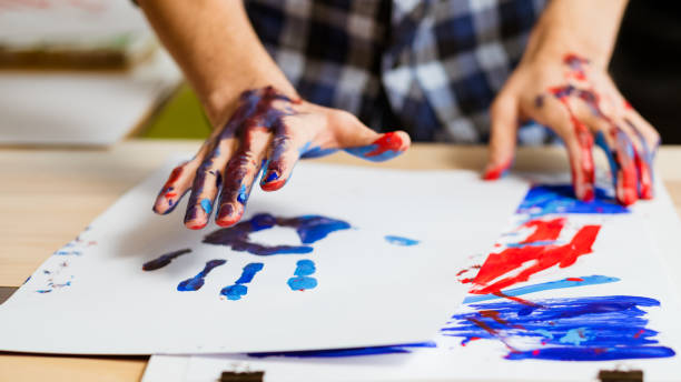 art therapy school paint hand print paper